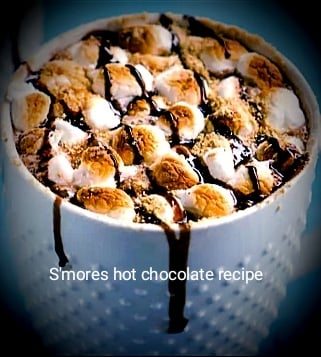 Recipe for Slimming World S'mores Hot Chocolate hot chocolate with marshmallow sauce mixed in and whipped cream and cracker on top!