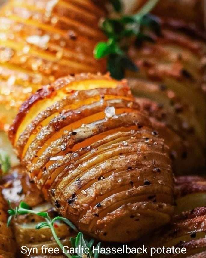 Syn Free, Garlic Hasselback Potatoes Garlic Hasselback Potatoes are one of the best kind of baked potato you will ever make, the buttery garlic melts perfectly into all the thin slices in the potato adding heaps of flavour.