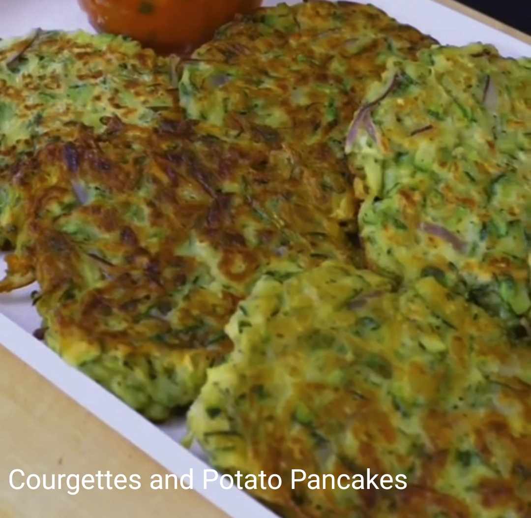 Courgette and Potato Pancakes This recipe for Zucchini Fritters is so easy to make and requires only a few ingredients is great for breakfast or brunch. The fritters are loaded with grated zucchini in an egg mixture with mashed potato and garlic pepper. This is definitely the BEST way to make zucchini fritters
