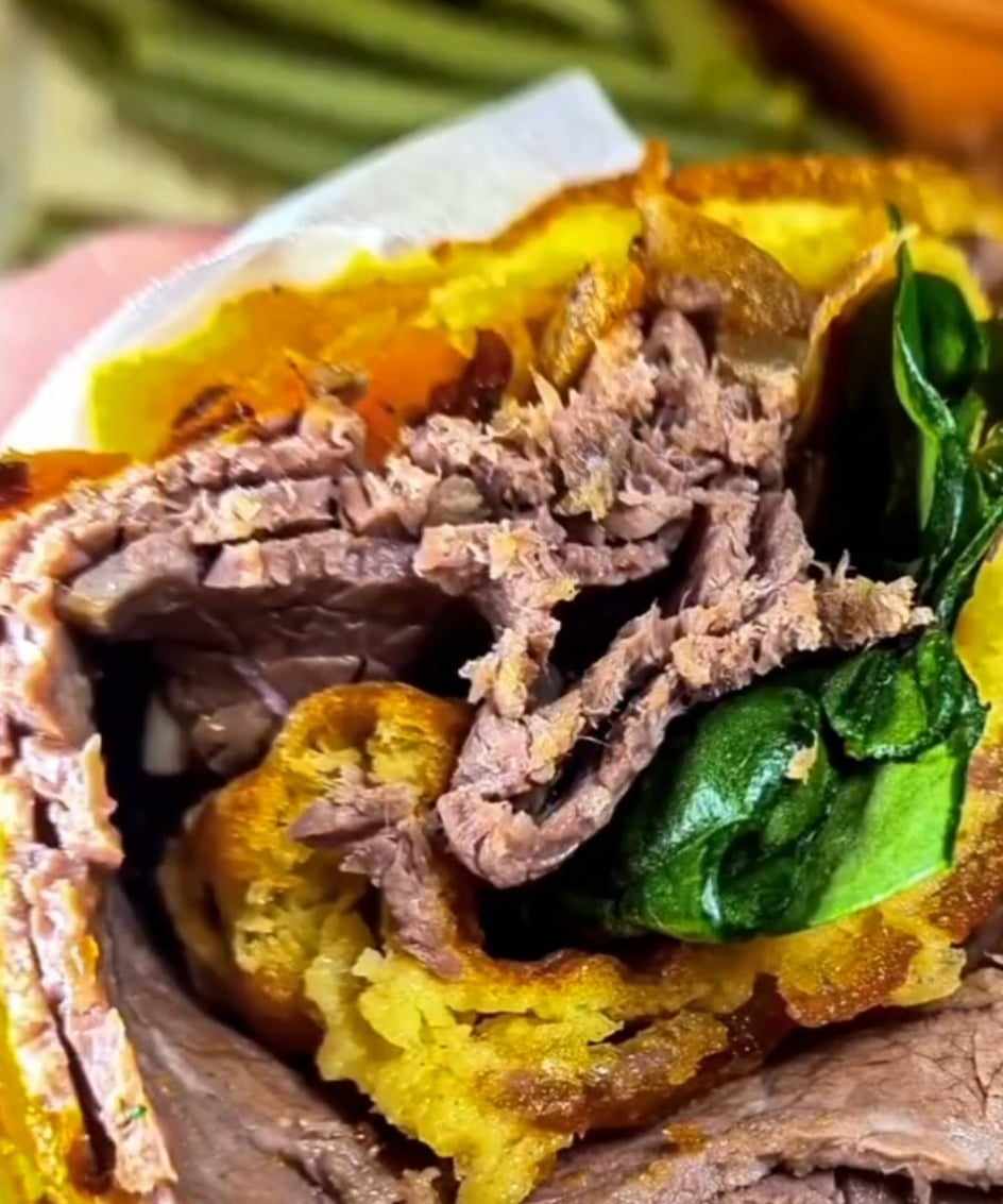 Yorkshire pudding wrap Recipe Tuck into something tasty this Monday, and every day, because good food means good mood. Good food with Slimming World looks something like this Yorkshire Pudding Wrap – not only is it tasty, it contains protein, iron and B vitamins which are all important for brain function and mood which might be just what we all need on this Monday About Time: Prep Time: 10 mins Cook Time: 25 mins Total Time: 25 mins Yield Serves 2 Slimming World: 4 Syncs per wrap Ingredients: 40g plain flour 50ml skimmed milk 3 medium eggs, beaten Low-calorie cooking spray 1 large lean beef steak (or 2 small ones), with visible fat removed 1 medium carrot, grated Handful of watercress Mustard powder made up with water, to taste Instructions: Combine the flour, milk, 20ml water, and beaten eggs in a jug. Whisk the mixture until it becomes smooth and free of lumps. Season with a pinch of salt and let it chill for 30 minutes. Preheat the oven to 220°C/fan 200°C/gas 7. Use low-calorie cooking spray to coat a medium-sized non-stick baking tray (approximately 30cm x 20cm), then place it in the oven to heat. Once hot, remove the tray and swiftly pour in the batter, tilting it to ensure even coverage of the base. Return the tray to the oven and bake for about 12-15 minutes or until the batter is puffed up and lightly browned. While the batter is baking, heat a non-stick frying pan over high heat, and spray it with low-calorie cooking spray. Cook the steak according to your preference (approximately 2 minutes on each side for rare, 3 minutes for medium, and 4 minutes for well done). Wrap the cooked steak in foil and allow it to rest for at least 5 minutes before slicing it to your desired thickness. Transfer the Yorkshire pudding from the tin to a cutting board, slice it in half, and top each half with grated carrot, watercress, and sliced beef. Drizzle with mustard, season lightly, and roll up each half to create two wraps. Tip: For a complete roast dinner experience, prepare some gravy using gravy granules (1 level tsp is 1 Syn) with boiling water and drizzle it over the wraps before rolling them up Ensure that the flour, milk, water, and egg mixture is well-whisked to achieve a smooth and lump-free batter. Preheat the baking tray before pouring in the batter to help create a crispy base. For a juicy and flavorful steak, season it with your favorite spices before cooking. Allow the steak to rest after cooking; this ensures that the juices redistribute, keeping the meat tender. Use fresh and vibrant vegetables. Explore different fillings such as sautéed mushrooms, caramelized onions, or a variety of greens to add more texture and flavor to the wraps. Serve the wraps with a side salad, coleslaw, or roasted vegetables to create a well-rounded and satisfying meal.
